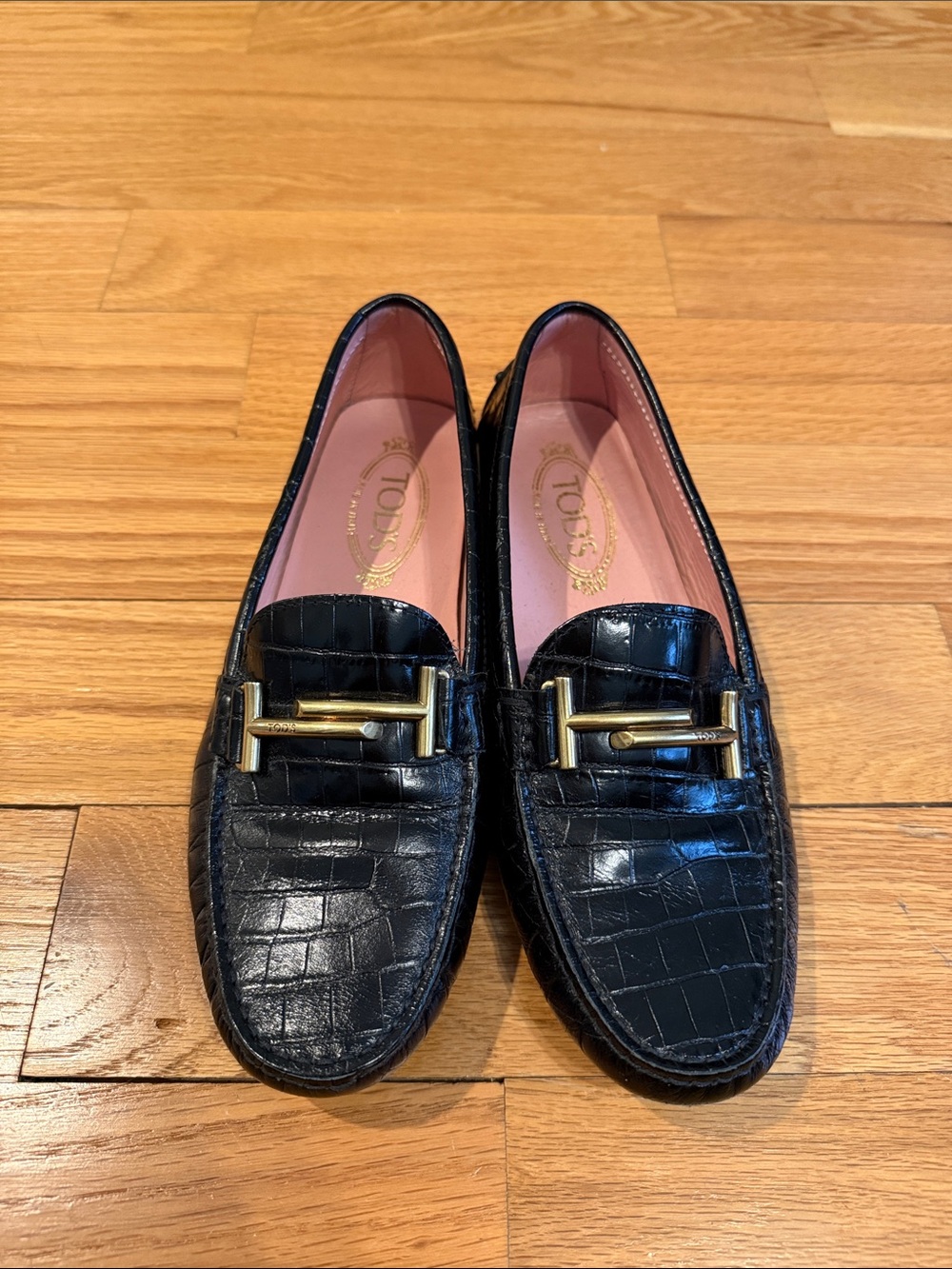 Tod’s Black Croc-Embossed Loafers with Gold Buckle